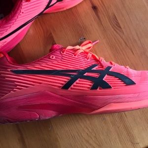 ASICS red and orange tennis shoes